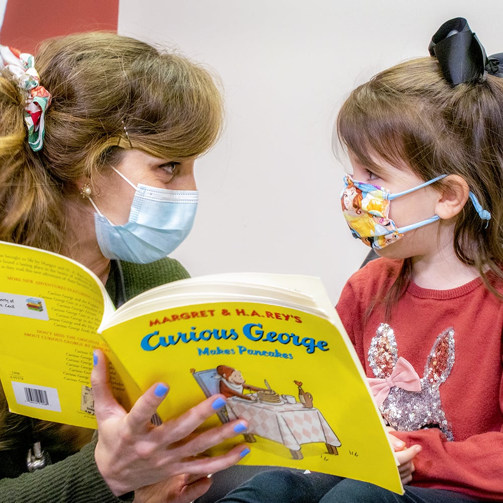 doctor reading to child